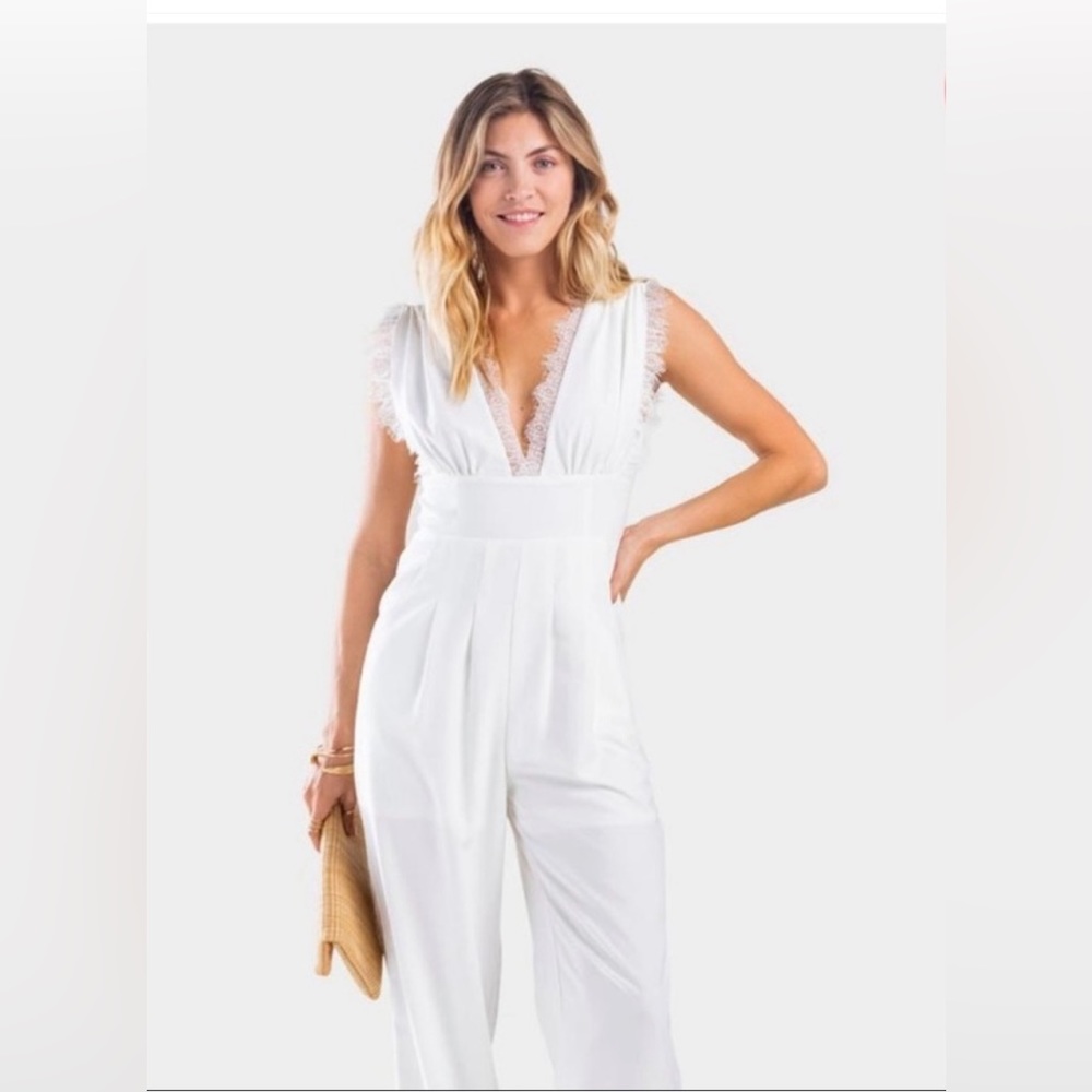 Francesca’s white jumper with lace details size M